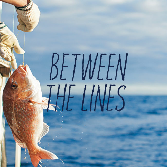 Between the Lines tagline overlayed on a photo of a fish being caught on a boat