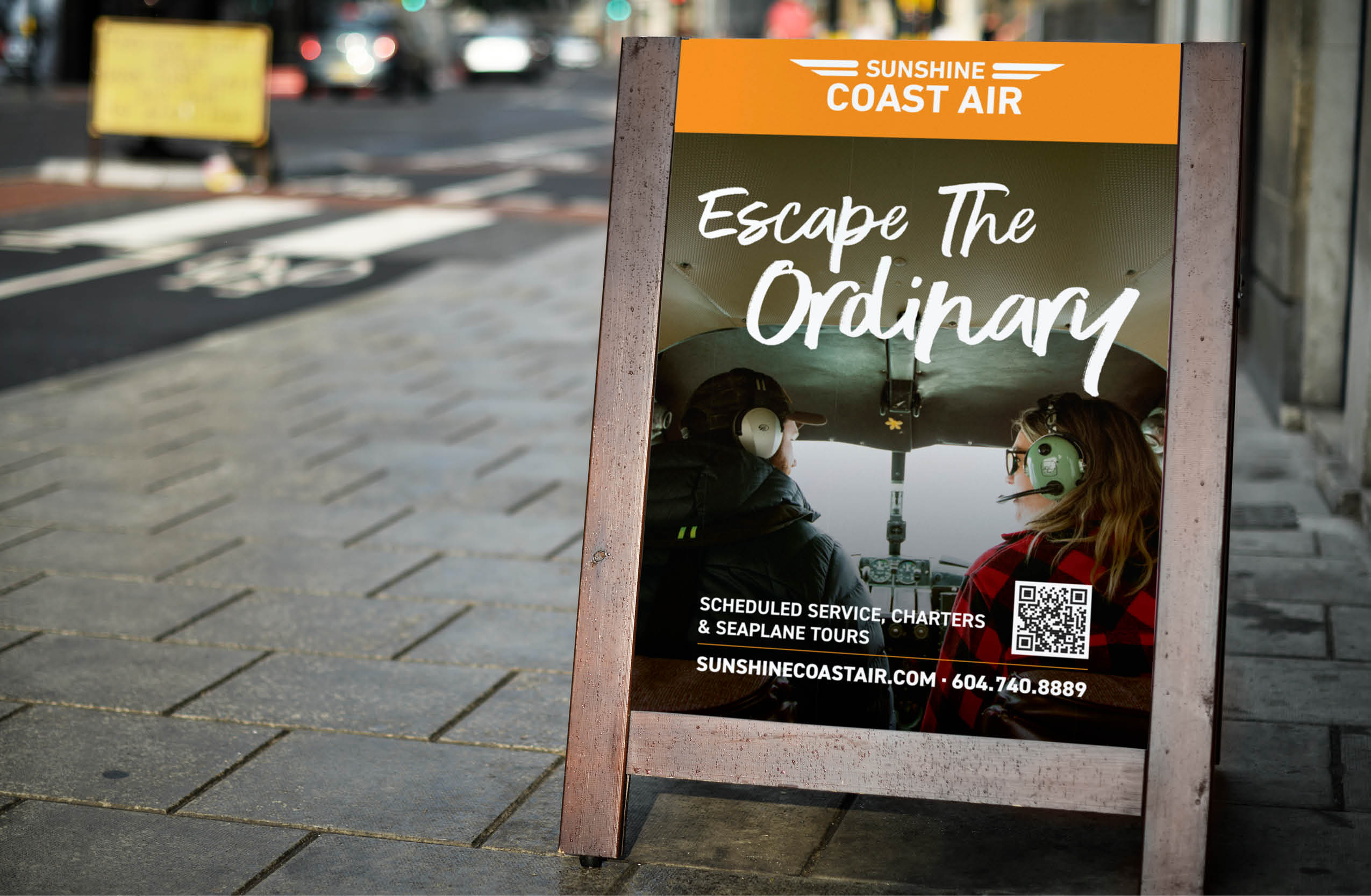 Sunshine Coast Air Sandwich Board for service, charters and seaplane tours