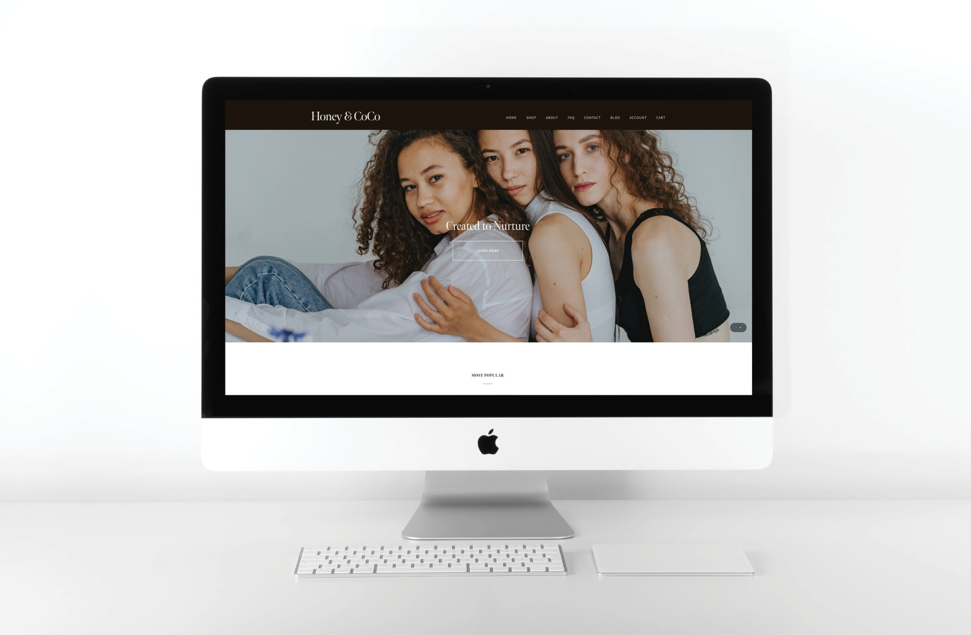Honey & CoCo custom website mockup on mac desktop